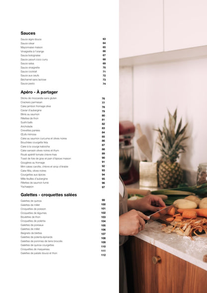Livre de recettes montrant des recettes low fodmap avec des légumes frais sur un plan de travail